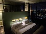 Deluxe Room at night at Casa Habita in Guadalajara
