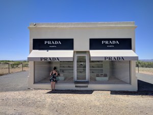 Max window shopping at Prada Marfa in Valentine Texas