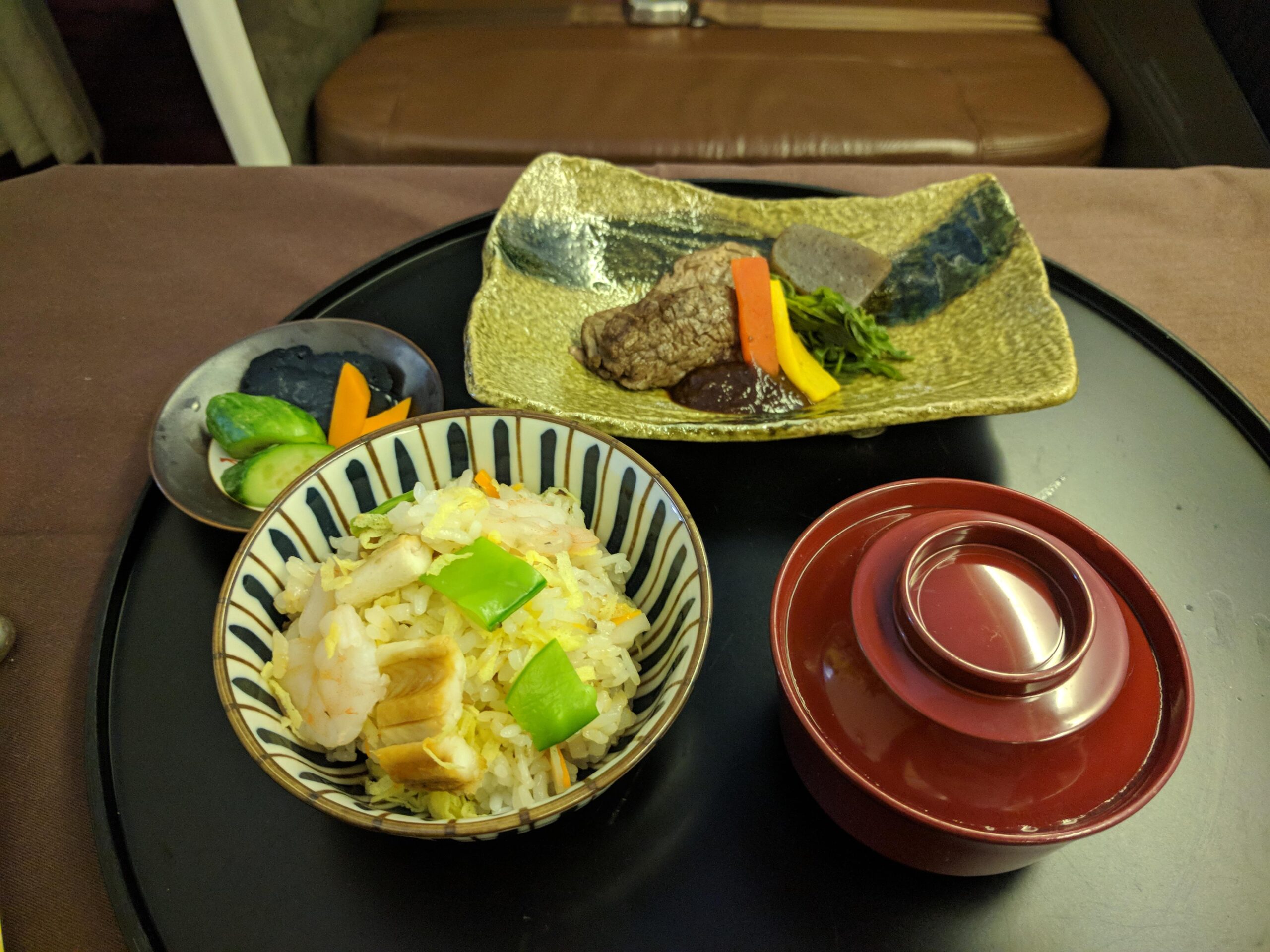 Steamed rice, miso soup, Japanese pickles, and beef steak with miso sauce