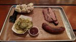 Brisket, sausage, pickles and potato salad at Green Street BBQ