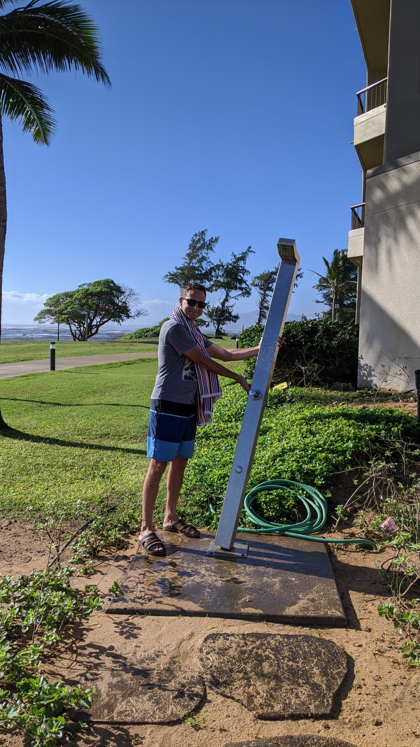 Sheraton Kauai Coconut Beach: Jason trying to keep the broken shower up