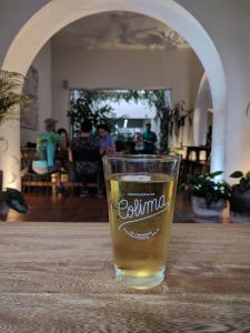 Enjoying a Colima beer, the Cayoco Tropical Ale at Casa Trapiche
