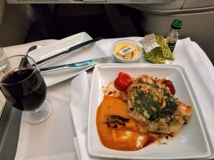 TAP Air Portugal's A330neo from LIS to EWR: main dish of roasted lamb in pastry with pumpkin puree, spinach and hazelnuts