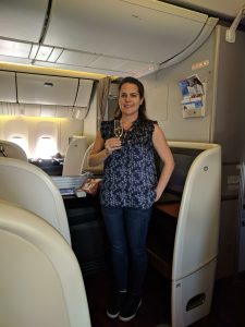 Max anjoying Salon 2007 champagne in Japan Airlines First Class