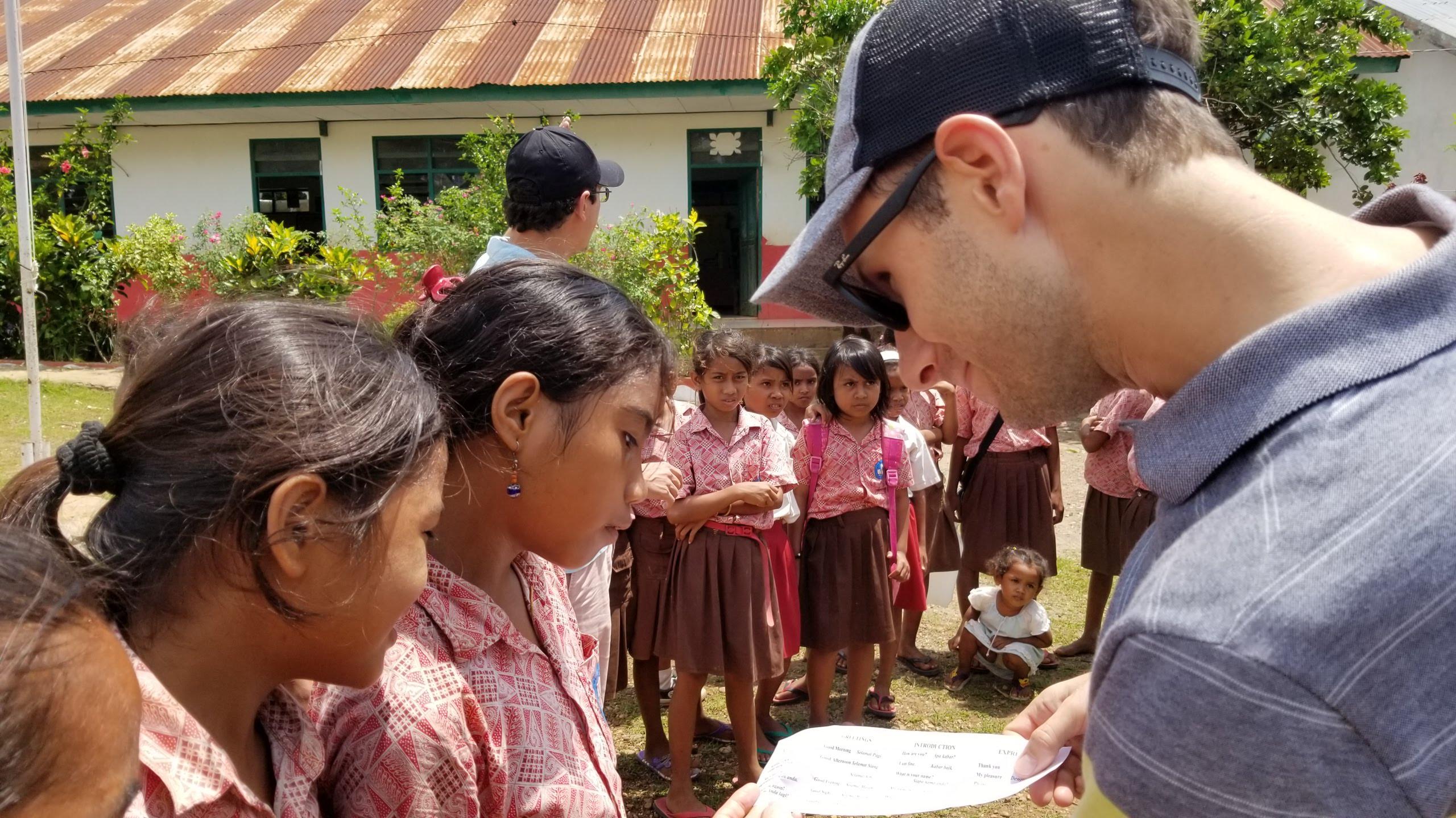 Jason chatting with the kids in English and Bahasa