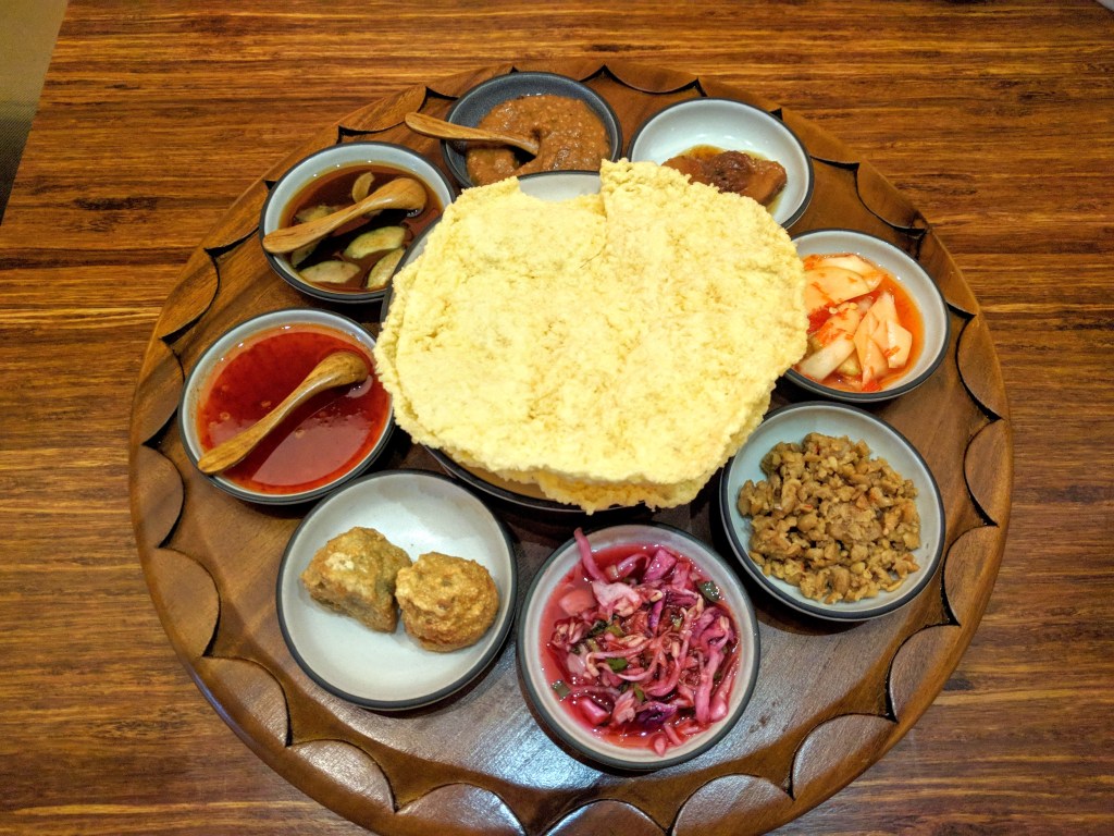 Starter at Nusantara; krupuk with condiments