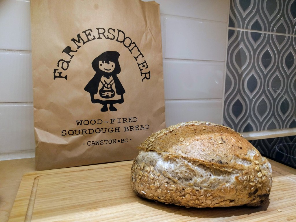 Freshly baked flax sourdough bread by Farmersdotter