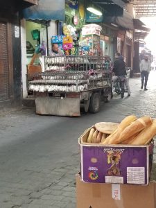 Streets in the medina; yes those are live chickens!