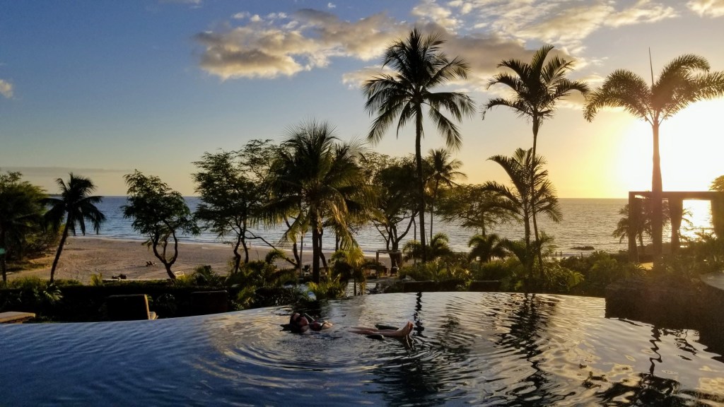 Max enjoying the adult's pool at sunset