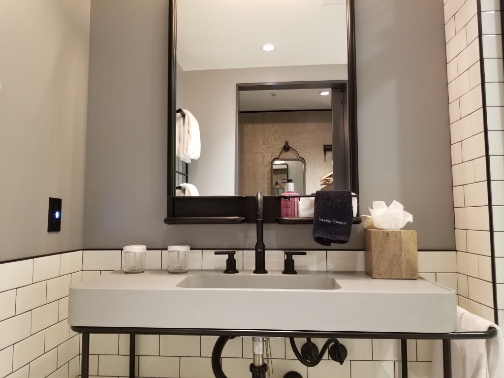 Bathroom sink and vanity (not pictured is the pink hair dryer)