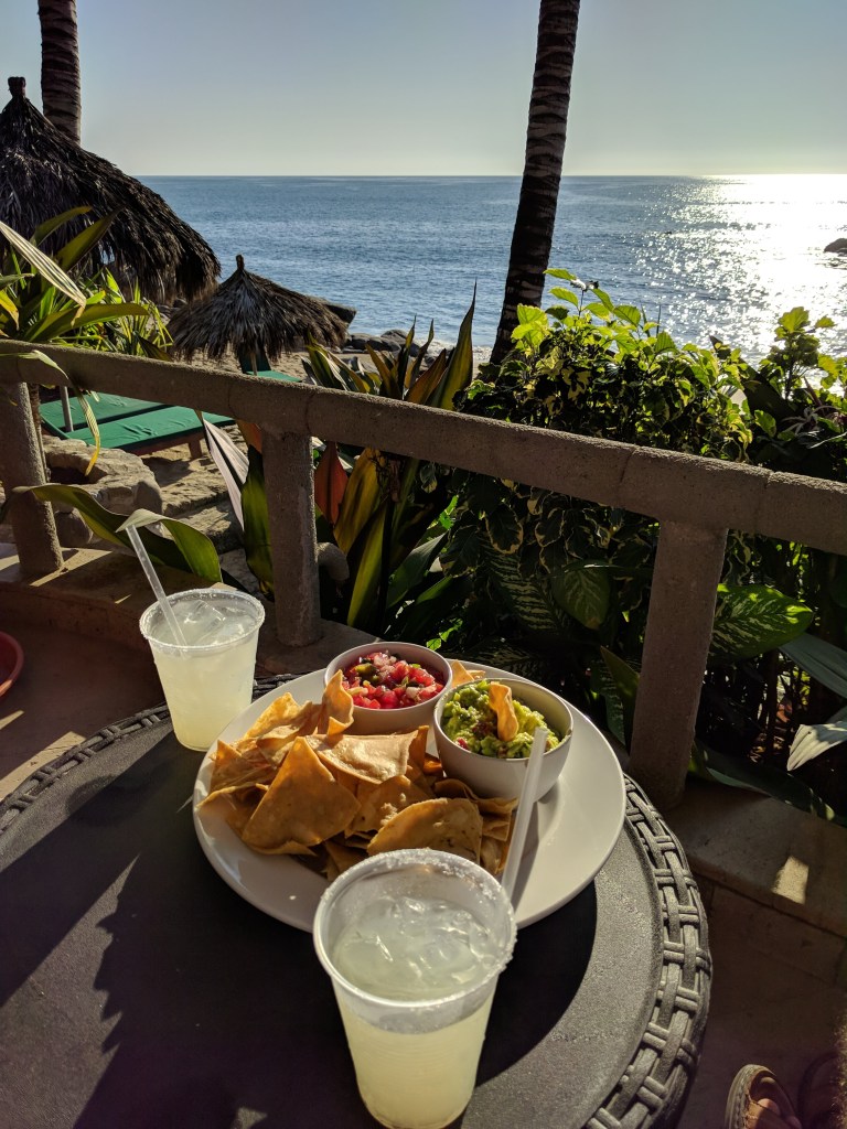 Happy hour margaritas and chips and gucamole with pico de gallo