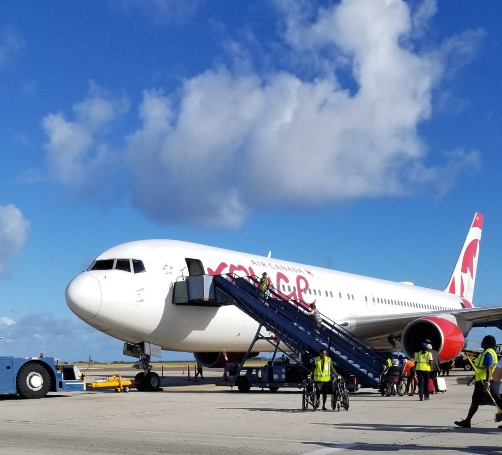 Boarding Air Canada Rouge 1715 at BGI