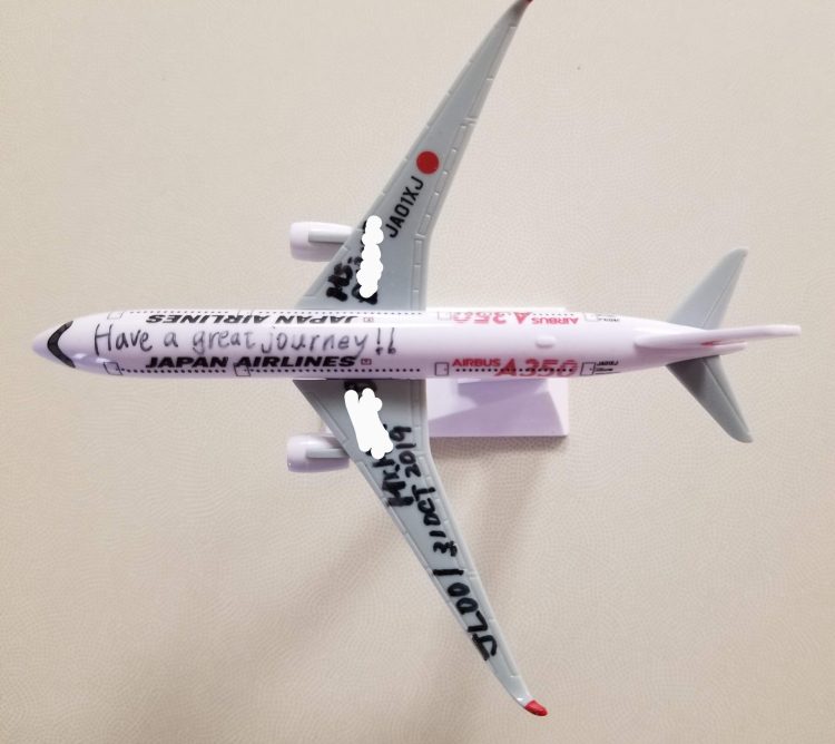 The A350 miniature mode; airplane given to us with a hand-written note on the 777 in JAL First Class