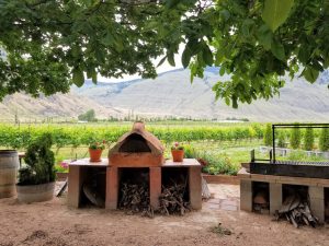 Outdoor area at Orofino with South American-style grill