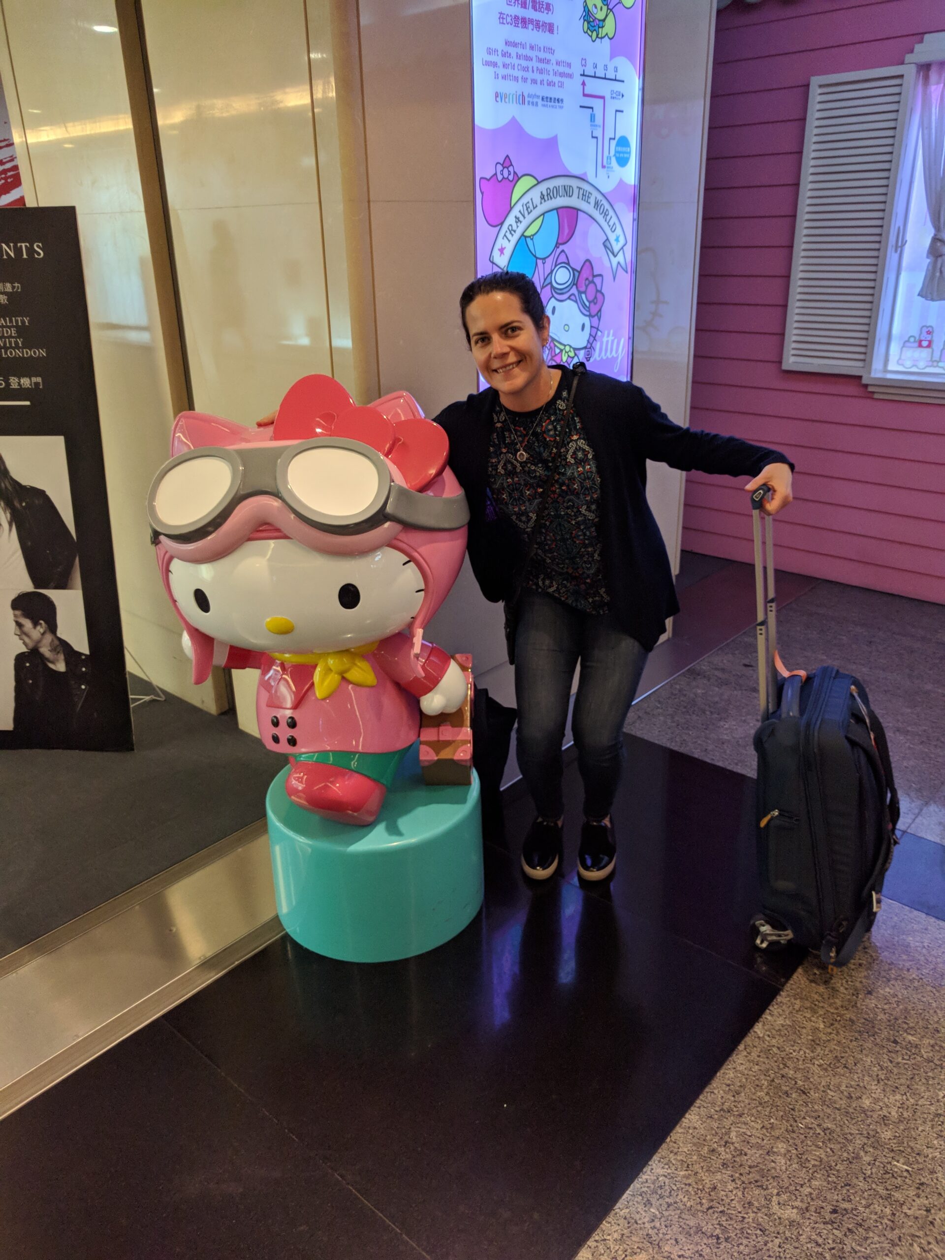 Max, Hello Kitty, and the Thule bag at Taipei Airport