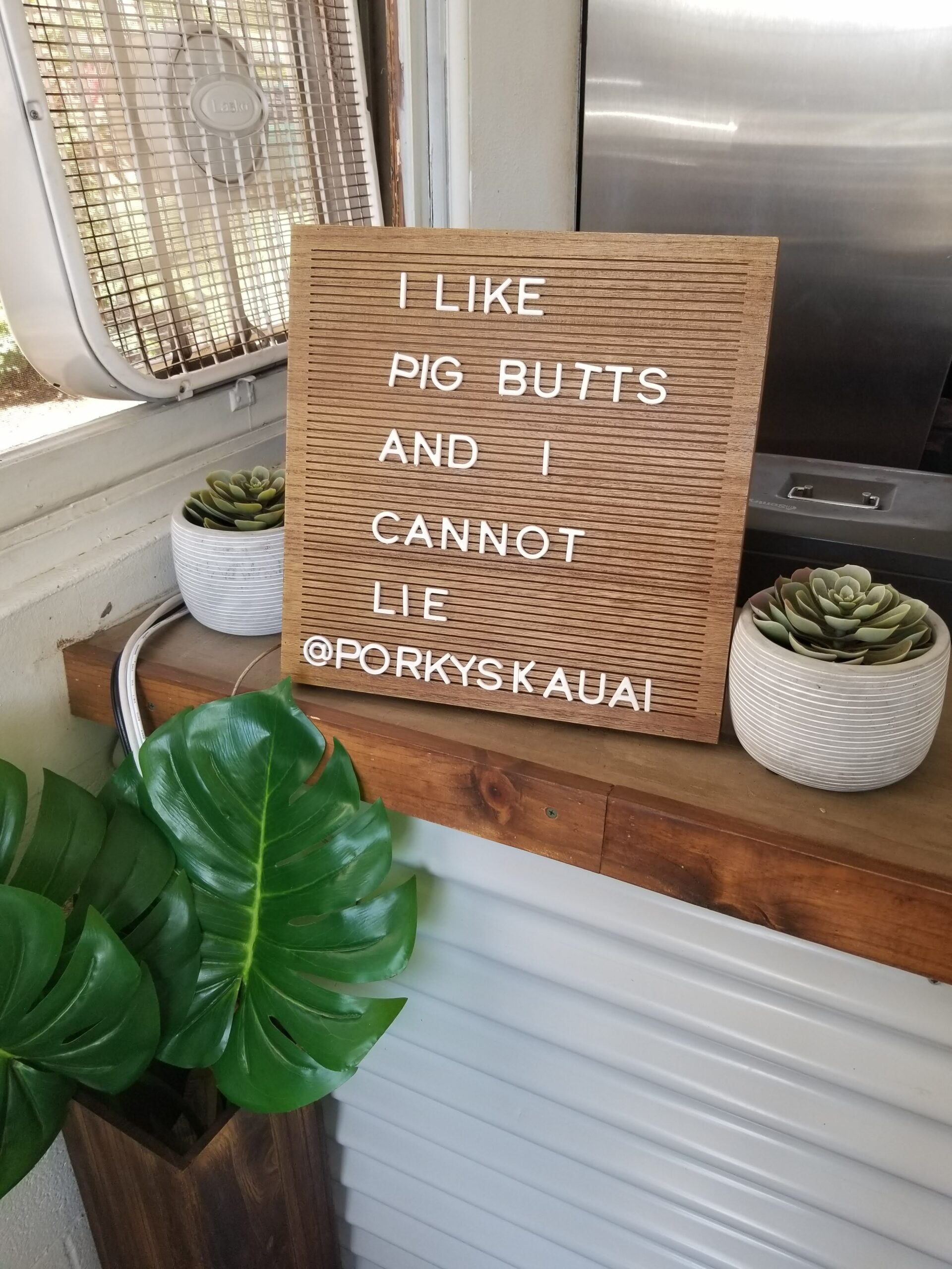 Cute sign at Porky's in Waimea