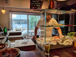 The pizza being made at Savoy