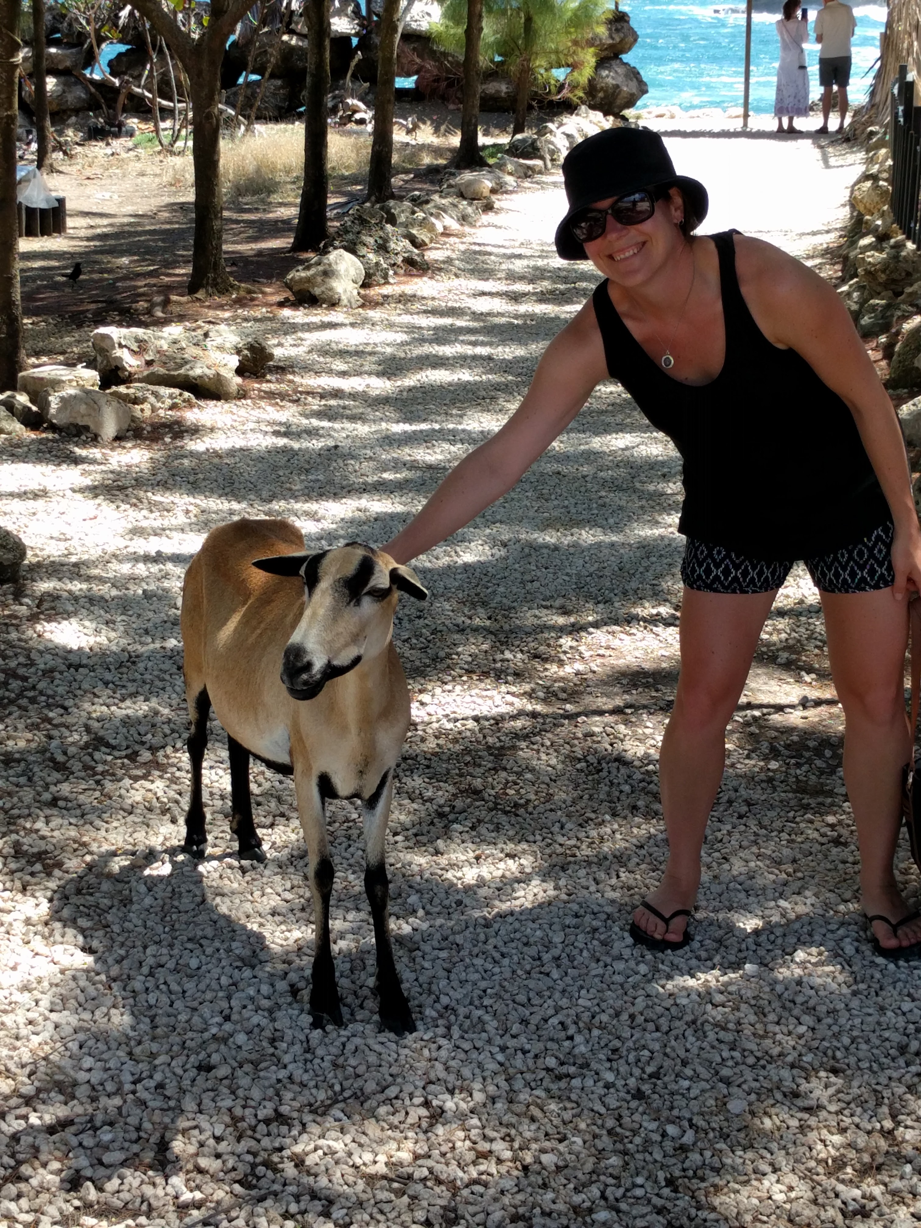 Max at the Animal Flower Cave with a goat