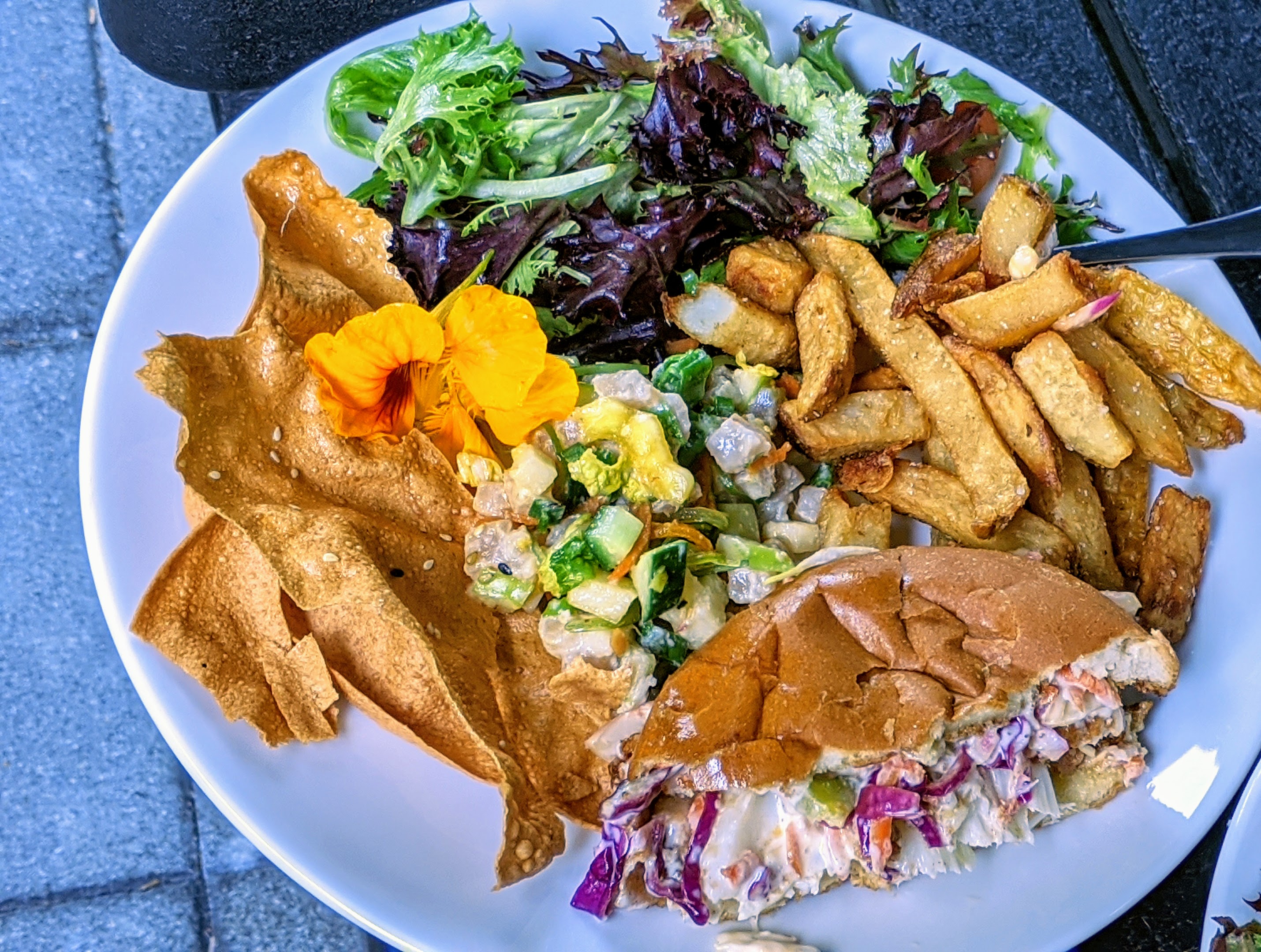 Food from Raven Lady; we shared a cod burger and fries and tuna tartare. Yes, those are edible flowers!