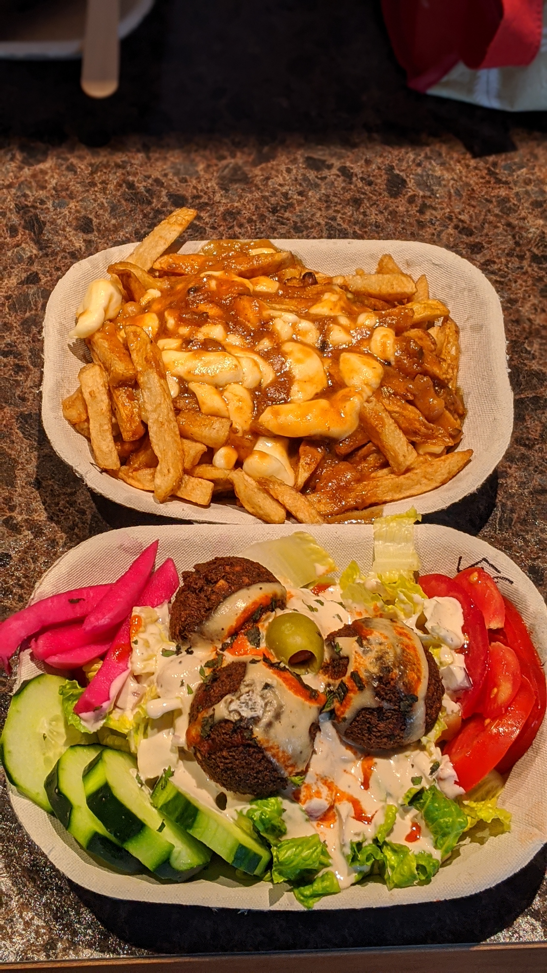 A poutine and falafel salad