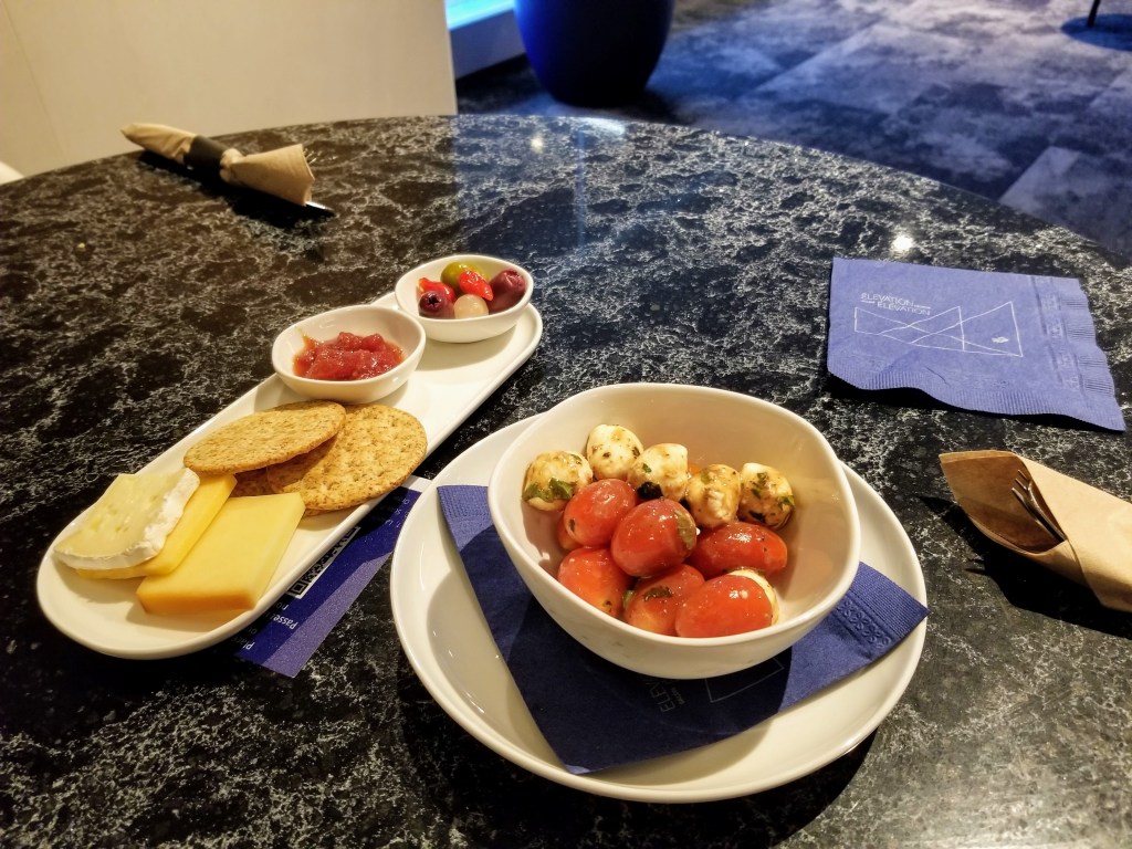 YYC WestJet Elevation Lounge: Cheese plate and caprese salad