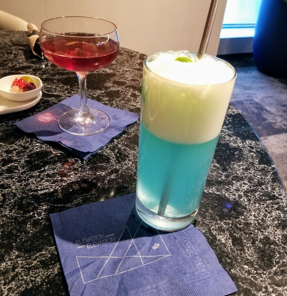 YYC WestJet Elevation Lounge: WestJet Elevation cocktail (right) and Holorime (left)