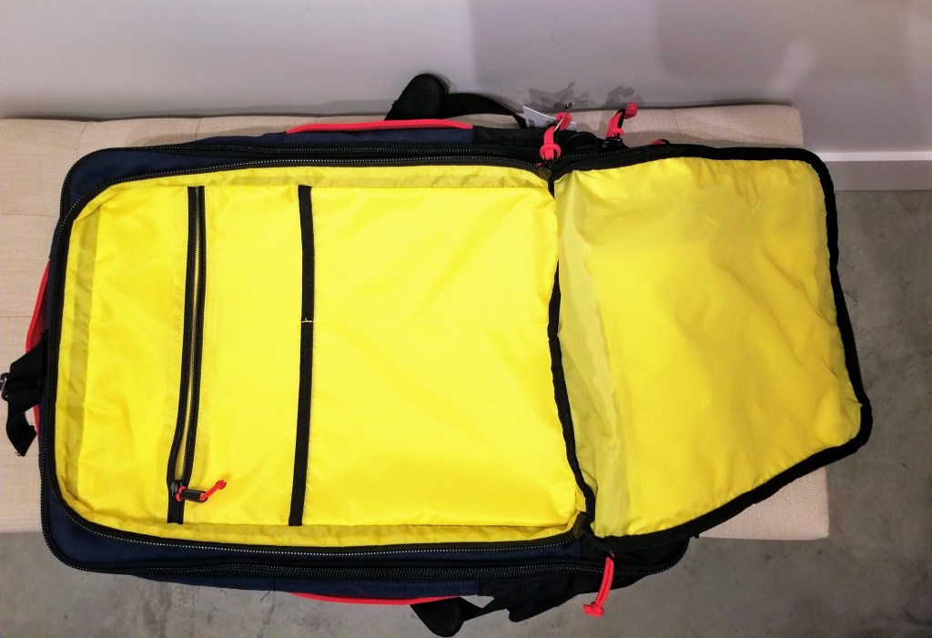 Topo Designs 40L Travel Bags: this compartment is good for storing documents and thin items