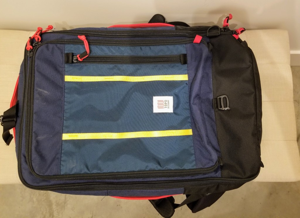 Topo Designs 40L Travel Bags: the exterior of the bag also has a small pocket to store keys and documents like passports for easy access in transit