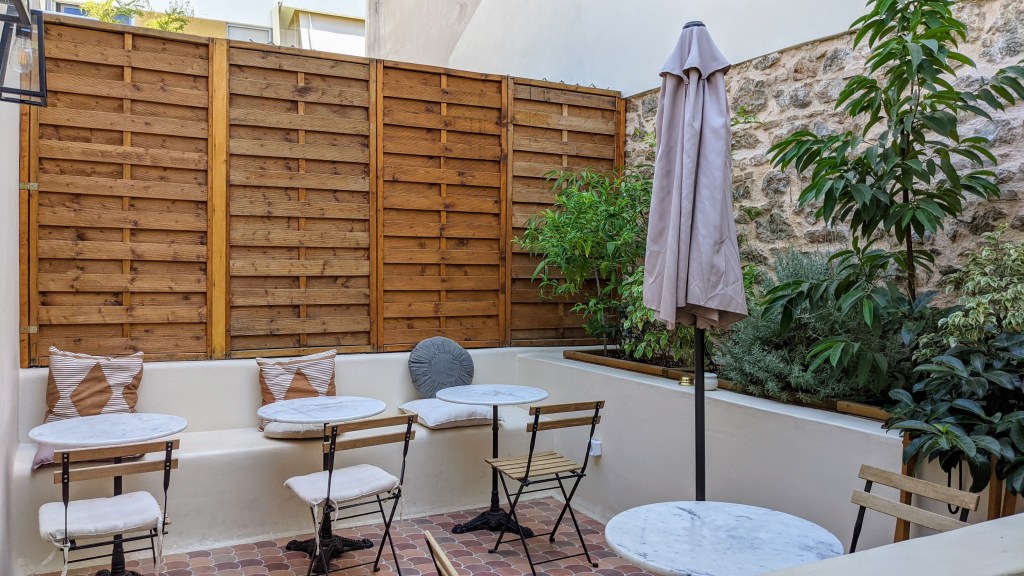 Monsieur Didot common area: outdoor courtyard seating outside our room