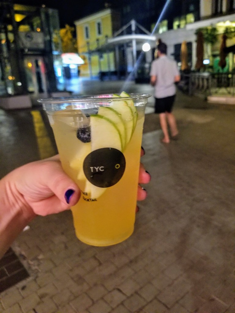 Walking in Athens with a white sangria from TYCO (Take Your Cocktail Out)