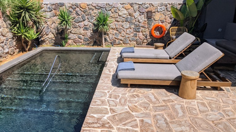 Tropical Open Plan Suite with shared pool: outdoor seating and pool