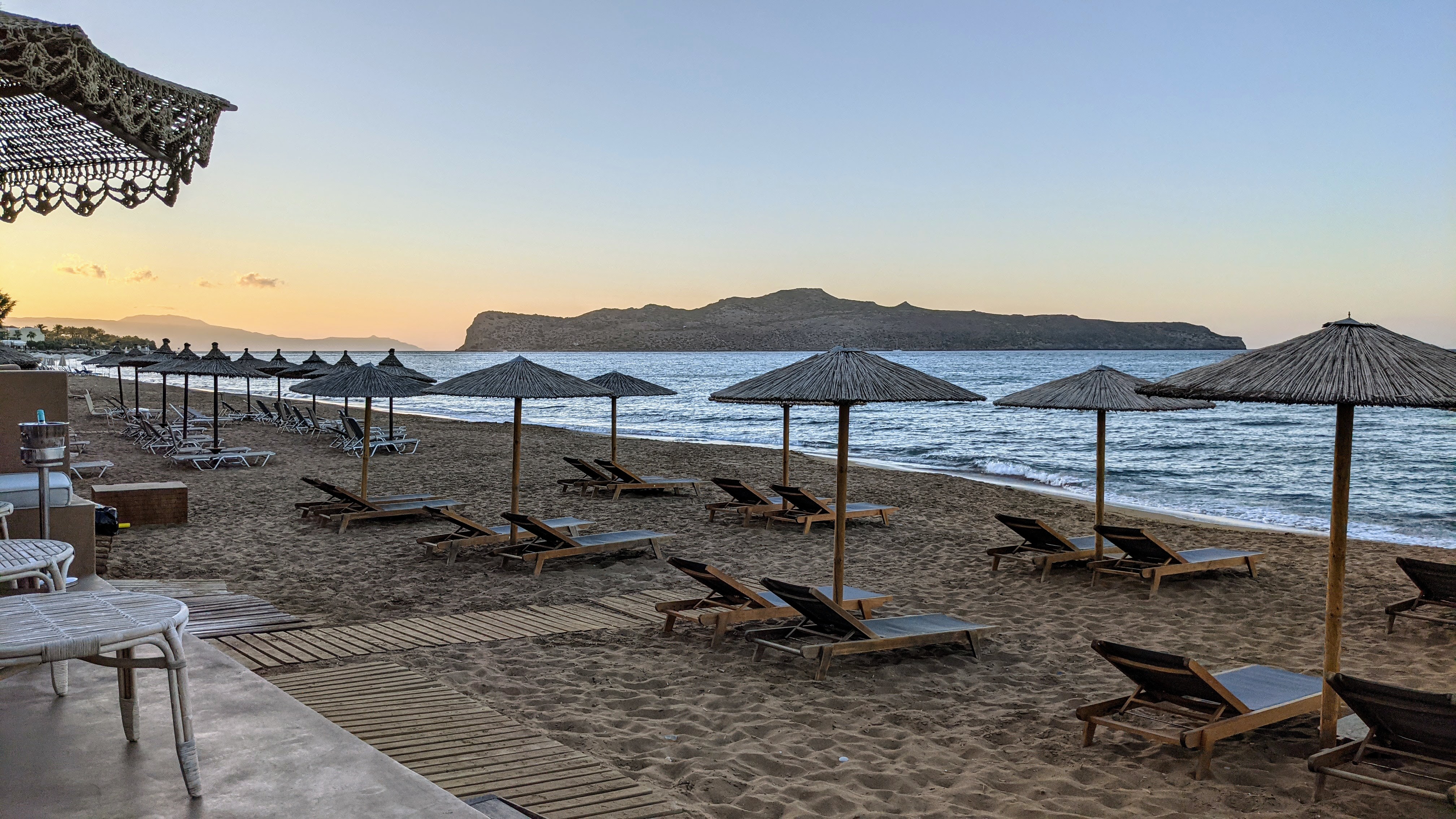 Lounge chair and umbrellas at the beach