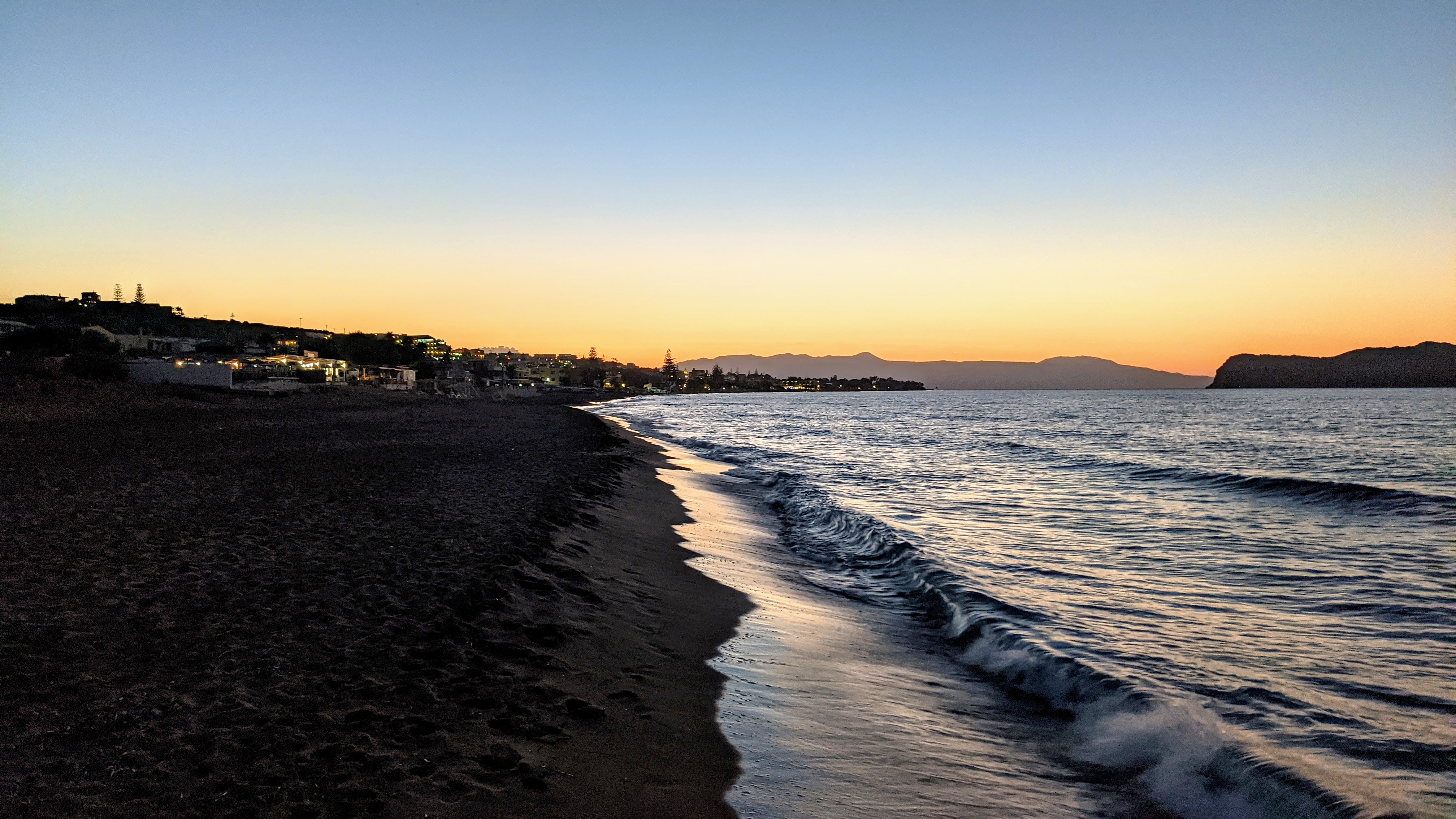 Walking down the beach at sunset