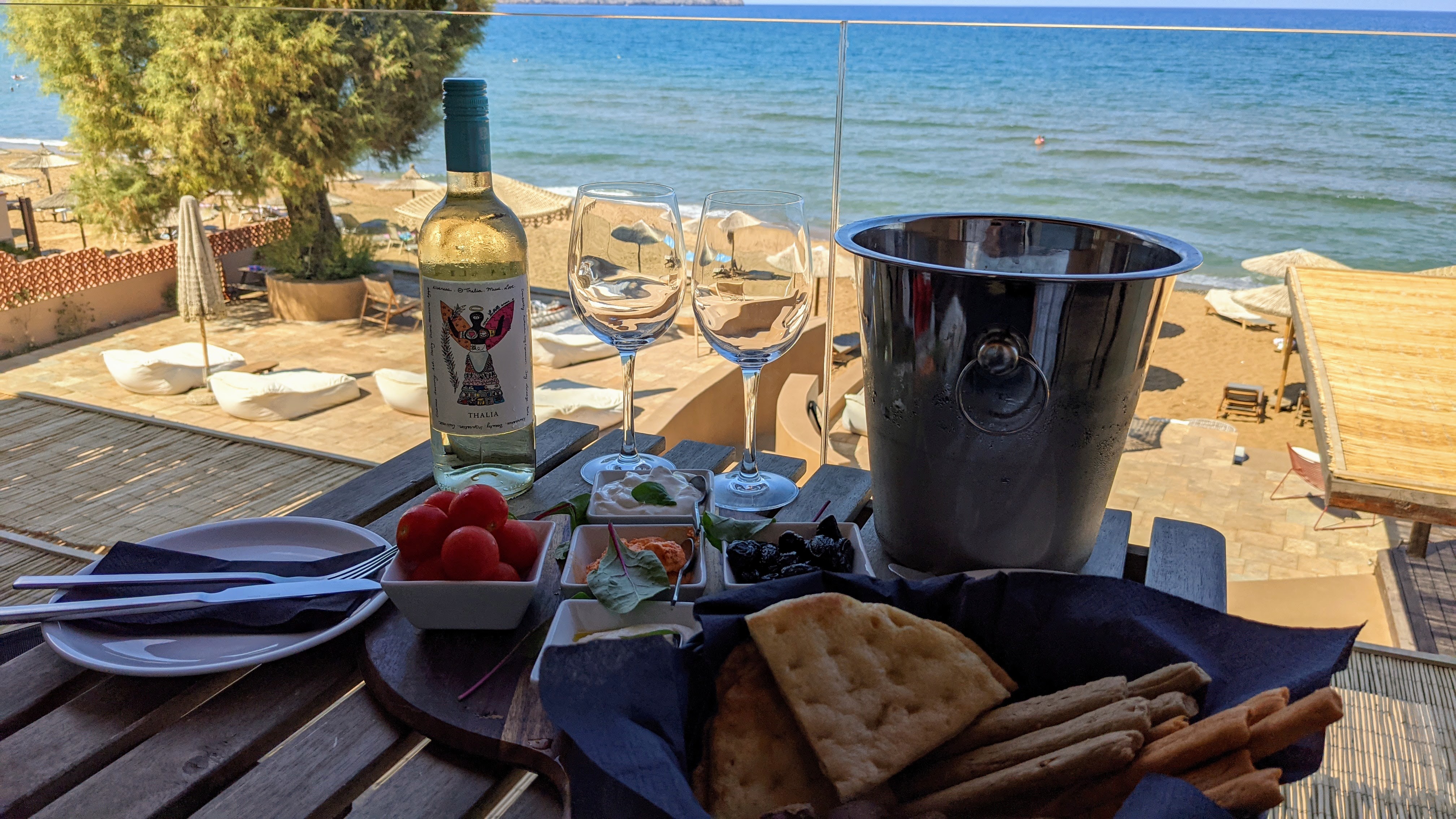 The welcome plate and wine at The Theodore Boutique Hotel