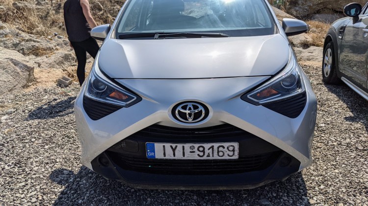 Inspecting our rental car, a Toyota Aygo...after looking for it all over the airport parking lot!